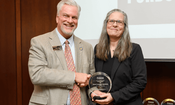 Shelley MacDermid Wadsworth receiving Purdue Faculty Engagement Award