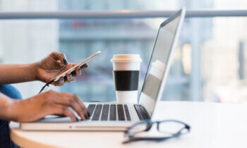 Woman typing on computer