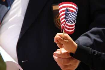 Child holding a U.S. flag