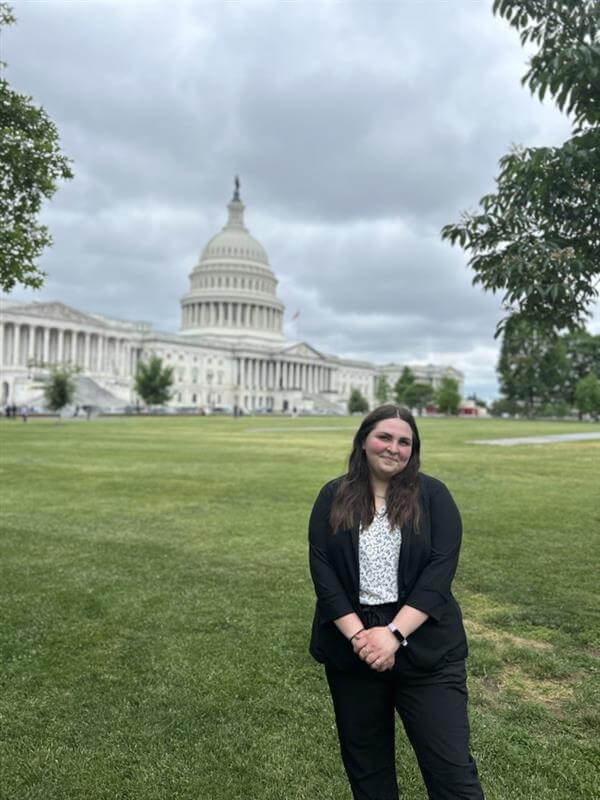 Photo showing Sybil Culter in front of the U.S. Capitol building.